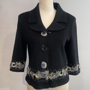 Black Knit jacket with delicate embroidery.